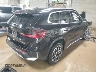2023 BMW X1 xDrive28i with VIN WBX73EF08P5X85250, listed as a Copart auction lot 50158565 with 7,312 mi miles and Salvage Title. Bid and sale history available at DreamBid. Image 3.