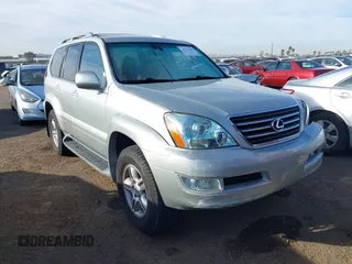 2004 Lexus GX 470 with VIN JTJBT20X340025955, listed as a IAAI auction lot 41673289 with 106,701 mi miles. Bid and sale history available at carsss.com. Image 1.