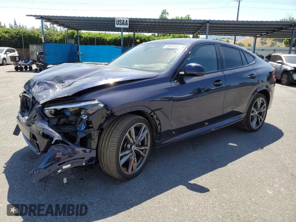 2023 BMW X6 M50i with VIN 5UXCY8C09P9P28422, listed as a Copart auction lot 52818133 with 4,131 mi miles and Salvage Title. Bid and sale history available at carsss.com. Image 1.