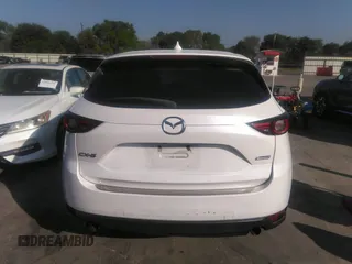 2018 Mazda CX-5 Grand Touring with VIN JM3KFADM4J0309540, listed as a IAAI auction lot 41868480 with 89,110 mi miles. Bid and sale history available at carsss.com. Image 17.