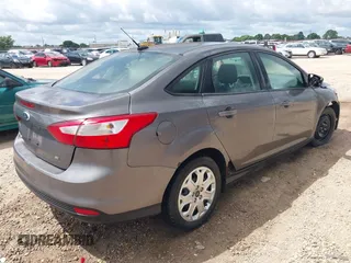 2012 Ford Focus SE with VIN 1FAHP3F21CL199240, listed as a IAAI auction lot 42409719 with 137,684 mi miles and . Bid and sale history available at DreamBid. Image 4.