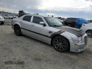 2007 Chrysler 300 C SRT8 with VIN 2C3LA73W07H660214, listed as a Copart auction lot 70283834 with 249,130 mi miles and Salvage Title. Bid and sale history available at carsss.com. Image 4.