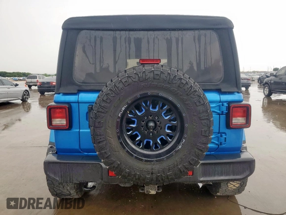 2023 Jeep Wrangler Sahara with VIN 1C4HJXEG7PW590252, listed as a Copart auction lot 59377765 with 32,689 mi miles and Salvage title. Bid and sale history available at DreamBid. Image 6.