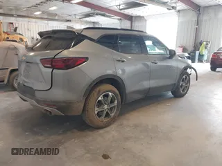 2023 Chevrolet Blazer LT z VIN 3GNKBCR4XPS214756, wystawiony jako IAAI lot #42097217 z przebiegiem 26 783 mil mil oraz . Historia ofert i sprzedaży dostępna na DreamBid. Obrazek 4.