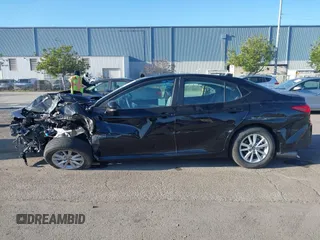 2025 Toyota Camry LE with VIN 4T1DAACKXSU576221, listed as a IAAI auction lot 41548642 with Not Provided miles and . Bid and sale history available at DreamBid. Image 14.
