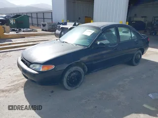 1998 Ford Escort LX с VIN 1FAFP10P5WW237944, выставлен на аукционе IAAI как лот 42239266 с пробегом 238 540 миль миль и . История ставок и продаж доступна на DreamBid. Изображение 2.