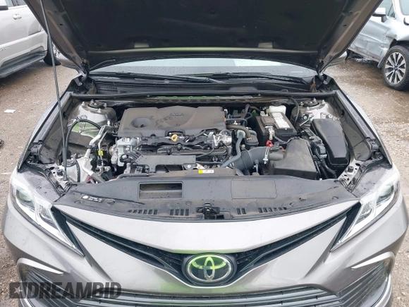 2024 Toyota Camry LE z VIN 4T1C11AK2RU879602, wystawiony jako IAAI lot #42162353 z przebiegiem 6 185 mil mil oraz . Historia ofert i sprzedaży dostępna na DreamBid. Obrazek 10.