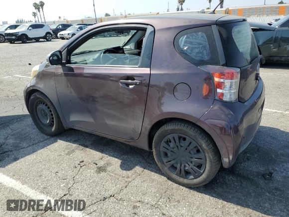 2013 Scion iQ with VIN JTNJJXB05DJ022305, listed as a Copart auction lot 58787155 with 136,046 mi miles and Salvage title. Bid and sale history available at DreamBid. Image 2.