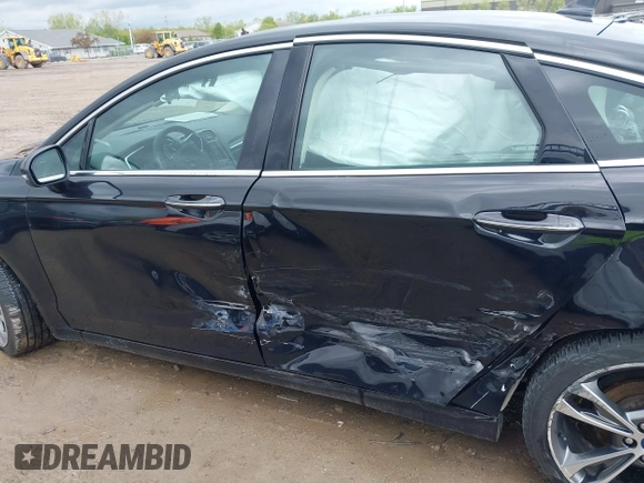 2019 Ford Fusion Titanium with VIN 3FA6P0K92KR248521, listed as a IAAI auction lot 42198307 with 51,844 mi miles and . Bid and sale history available at DreamBid. Image 14.