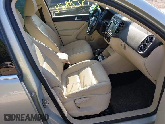 2012 Volkswagen Tiguan SE with VIN WVGBV7AX7CW580259, listed as a IAAI auction lot 42719624 with 94,710 mi miles and . Bid and sale history available at DreamBid. Image 5.