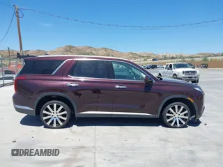 2023 Hyundai Palisade Limited with VIN KM8R5DGEXPU521968, listed as a IAAI auction lot 42148561 with 81,209 mi miles and . Bid and sale history available at DreamBid. Image 14.