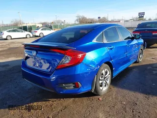 2017 Honda Civic Sedan LX with VIN 19XFC2F64HE010557, listed as a IAAI auction lot 41433110 with 111,418 mi miles. Bid and sale history available at carsss.com. Image 4.