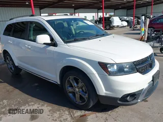 2016 Dodge Journey Crossroad Plus z VIN 3C4PDCGB1GT123668, wystawiony jako IAAI lot #41699950 z przebiegiem 91 410 mil mil oraz . Historia ofert i sprzedaży dostępna na DreamBid. Obrazek 1.