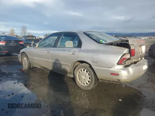 1996 Honda Accord EX with VIN 1HGCD5655TA161445, listed as a Copart auction lot 82195004 with 192,130 mi miles and Salvage Title. Bid and sale history available at DreamBid. Image 2.