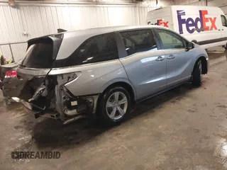 2018 Honda Odyssey EX-L with VIN 5FNRL6H74JB102004, listed as a IAAI auction lot 41724551 with 85,083 mi miles and . Bid and sale history available at DreamBid. Image 4.