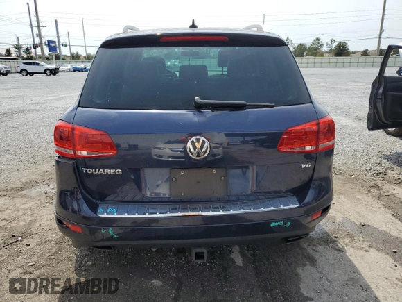2013 Volkswagen Touareg Lux с VIN WVGEF9BP0DD002456, выставлен на аукционе Copart как лот 56034435 с пробегом 131 412 миль миль и Списание • Salvage title. История ставок и продаж доступна на DreamBid. Изображение 6.