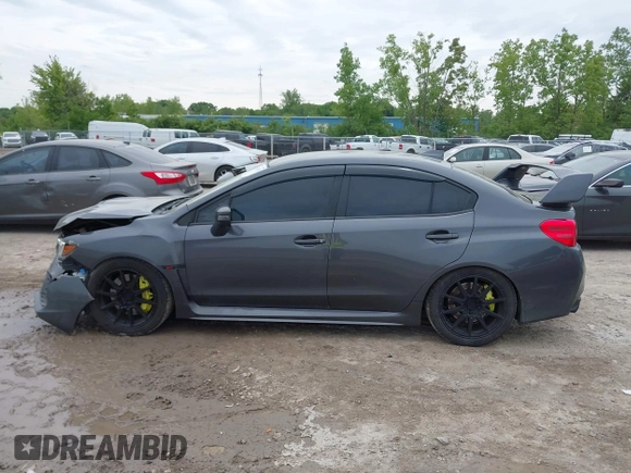 2020 Subaru WRX STI z VIN JF1VA2E65L9800214, wystawiony jako IAAI lot #42356355 z przebiegiem 80 377 mil mil oraz . Historia ofert i sprzedaży dostępna na DreamBid. Obrazek 14.