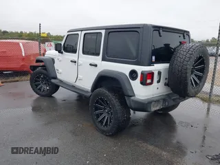 2019 Jeep Wrangler Unlimited Sport Altitude with VIN 1C4HJXDG3KW528647, listed as a IAAI auction lot 40986538 with 85,381 mi miles and . Bid and sale history available at DreamBid. Image 3.
