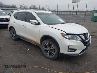 2019 Nissan Rogue SV with VIN JN8AT2MT4KW263267, listed as a IAAI auction lot 41155792 with 106,668 mi miles. Bid and sale history available at carsss.com. Image 1.
