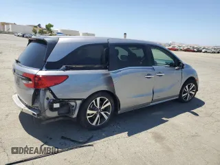 2023 Honda Odyssey Touring with VIN 5FNRL6H86PB043474, listed as a Copart auction lot 61672545 with 39,176 mi miles and Salvage title. Bid and sale history available at DreamBid. Image 3.