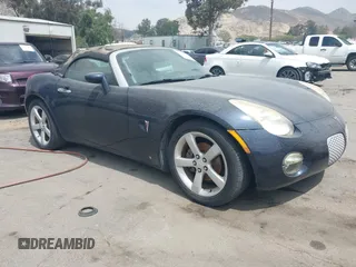 2006 Pontiac Solstice z VIN 1G2MB33B46Y100594, wystawiony jako IAAI lot #42142202 z przebiegiem 107 016 mil mil oraz . Historia ofert i sprzedaży dostępna na DreamBid. Obrazek 1.