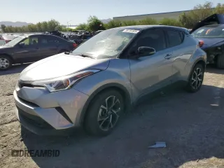 2019 Toyota C-HR XLE z VIN JTNKHMBX8K1026583, wystawiony jako Copart lot #56797325 z przebiegiem 87 364 mil mil oraz Szkoda całkowita • Salvage title. Historia ofert i sprzedaży dostępna na DreamBid. Obrazek 1.