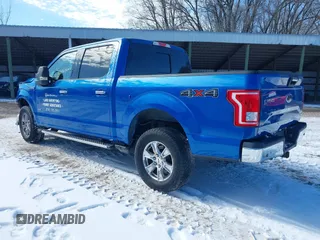 2015 Ford F-150 XLT with VIN 1FTEW1EG1FFA87638, listed as a IAAI auction lot 41597302 with 143,400 mi miles. Bid and sale history available at carsss.com. Image 3.