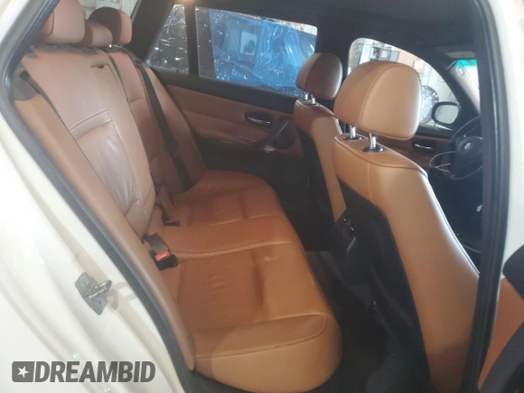 2011 BMW 3 Series 328i xDrive with VIN WBAUU3C52BA542628, listed as a Copart auction lot 71337384 with Not Provided miles and Salvage Title. Bid and sale history available at DreamBid. Image 10.