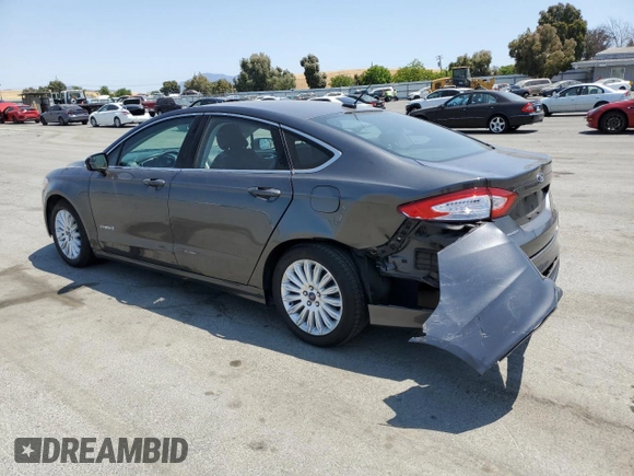 2016 Ford Fusion SE Hybrid with VIN 3FA6P0LU9GR166408, listed as a Copart auction lot 59931995 with 104,560 mi miles and Salvage title. Bid and sale history available at DreamBid. Image 2.