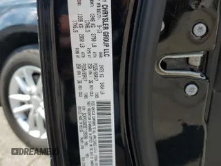 2014 Dodge Journey SXT with VIN 3C4PDCBG5ET126590, listed as a Copart auction lot 54770335 with 126,950 mi miles and Salvage Title. Bid and sale history available at DreamBid. Image 14.