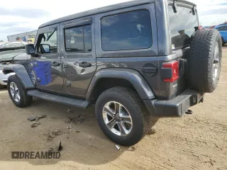 2021 Jeep Wrangler Unlimited Sahara High Altitude with VIN 1C4HJXEM5MW599937, listed as a Copart auction lot 71797814 with Not provided miles and Salvage title. Bid and sale history available at DreamBid. Image 2.