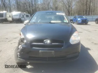2011 Hyundai Accent GS z VIN KMHCM3AC6BU198599, wystawiony jako Copart lot #52154795 z przebiegiem 116 842 mil mil oraz Szkoda całkowita • Salvage title. Historia ofert i sprzedaży dostępna na DreamBid. Obrazek 5.