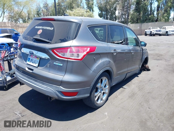 2013 Ford Escape SEL with VIN 1FMCU0H99DUA94443, listed as a IAAI auction lot 42713849 with 84,374 mi miles and . Bid and sale history available at DreamBid. Image 4.