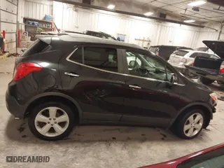 2015 Buick Encore Convenience with VIN KL4CJBSB9FB053324, listed as a IAAI auction lot 41298192 with 142,110 mi miles. Bid and sale history available at carsss.com. Image 14.