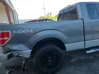 2014 Ford F-150 XL with VIN 1FTFX1EF9EFB27276, listed as a Copart auction lot 60633735 with 131,693 mi miles and Salvage title. Bid and sale history available at DreamBid. Image 14.