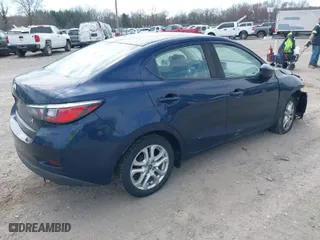 2017 Toyota Yaris iA with VIN 3MYDLBYV5HY169342, listed as a IAAI auction lot 41919676 with 100,893 mi miles. Bid and sale history available at carsss.com. Image 4.