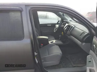 2015 Toyota Tacoma with VIN 3TMLU4EN7FM201302, listed as a IAAI auction lot 41666606 with 200,504 mi miles and . Bid and sale history available at DreamBid. Image 5.