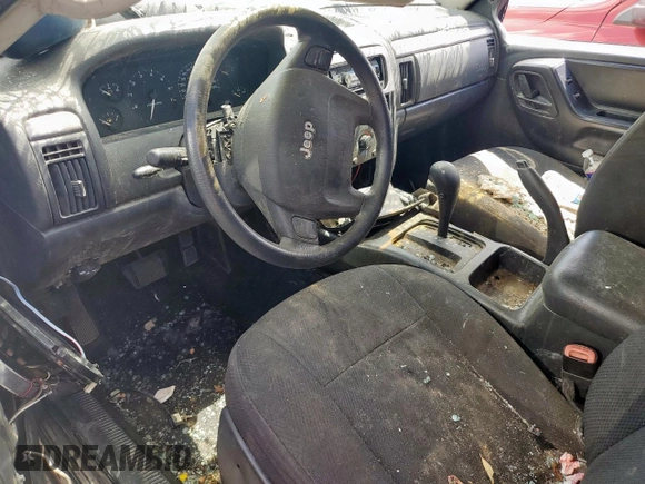 2003 Jeep Grand Cherokee Laredo with VIN 1J4GX48S63C604527, listed as a Copart auction lot 55996725 with Not provided miles and Non repairable. Bid and sale history available at DreamBid. Image 8.