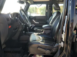 2016 Jeep Wrangler Unlimited Rubicon with VIN 1C4HJWFG3GL155092, listed as a Copart auction lot 62410365 with 82,231 mi miles and Salvage title. Bid and sale history available at DreamBid. Image 7.