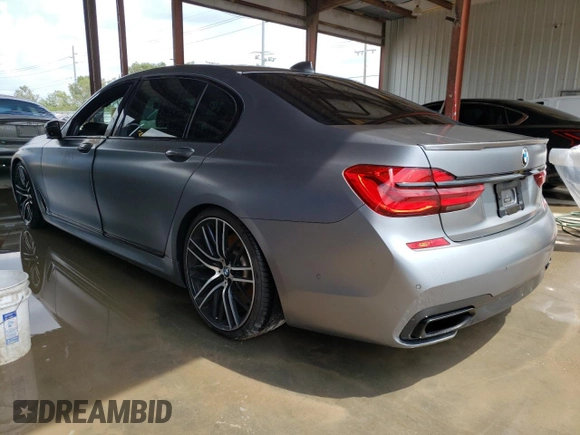 2017 BMW 7 Series 750i with VIN WBA7F0C37HGM22348, listed as a Copart auction lot 65400123 with 0 mi miles. Bid and sale history available at carsss.com. Image 2.