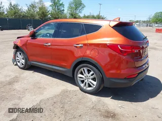 2013 Hyundai Santa Fe Sport z VIN 5XYZWDLA9DG094235, wystawiony jako IAAI lot #42264045 z przebiegiem 103 742 mil mil oraz . Historia ofert i sprzedaży dostępna na DreamBid. Obrazek 3.