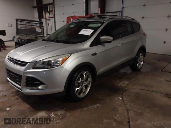 2013 Ford Escape Titanium z VIN 1FMCU0J94DUA93128, wystawiony jako IAAI lot #41612072 z przebiegiem 174 274 mil mil oraz . Historia ofert i sprzedaży dostępna na DreamBid. Obrazek 2.