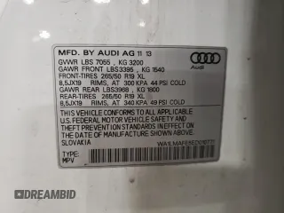 2014 Audi Q7 Premium Plus with VIN WA1LMAFE5ED010771, listed as a Copart auction lot 55587105 with 182,209 mi miles and Salvage title. Bid and sale history available at DreamBid. Image 13.