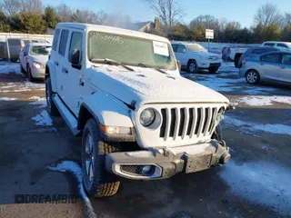 2021 Jeep Wrangler Unlimited Sahara z VIN 1C4HJXEG2MW827385, wystawiony jako IAAI lot #41534476 z przebiegiem 29 489 mil mil oraz . Historia ofert i sprzedaży dostępna na DreamBid. Obrazek 1.