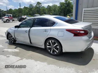 2017 Nissan Altima SR with VIN 1N4AL3AP8HN326495, listed as a Copart auction lot 61350135 with 106,159 mi miles and Salvage title. Bid and sale history available at DreamBid. Image 2.
