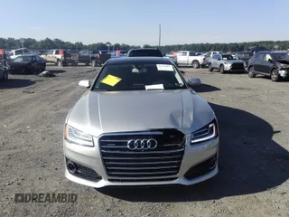 2017 Audi A8 with VIN WAU44AFD3HN014802, listed as a IAAI auction lot 42573537 with 121,096 mi miles and . Bid and sale history available at DreamBid. Image 12.