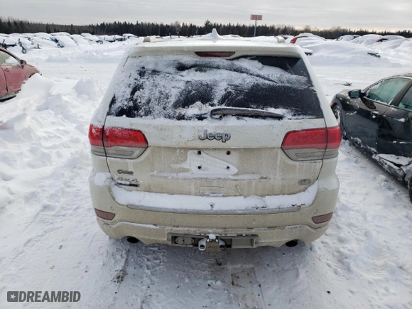 2014 Jeep Grand Cherokee Overland with VIN 1C4RJFCM9EC367863, listed as a Copart auction lot 43227105 with 221,273 mi miles and Salvage Title. Bid and sale history available at carsss.com. Image 6.