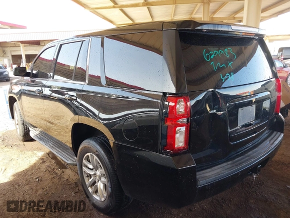 2015 Chevrolet Tahoe Commercial z VIN 1GNLC2EC0FR629983, wystawiony jako IAAI lot #41917584 z przebiegiem 111 461 mil mil oraz . Historia ofert i sprzedaży dostępna na DreamBid. Obrazek 3.