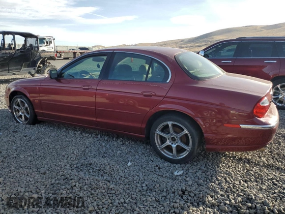 2000 Jaguar S-Type V8 z VIN SAJDA01D7YGL57521, wystawiony jako Copart lot #84539364 z przebiegiem Nie podano mil oraz Szkoda całkowita • Salvage title. Historia ofert i sprzedaży dostępna na DreamBid. Obrazek 2.
