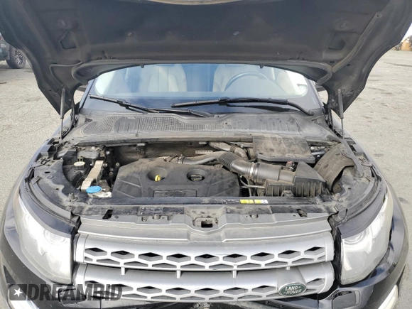 2015 Land Rover Range Rover Evoque Pure Plus с VIN SALVP2BG6FH076073, выставлен на аукционе Copart как лот 56125515 с пробегом 125 139 миль миль и Списание • Salvage title. История ставок и продаж доступна на DreamBid. Изображение 12.